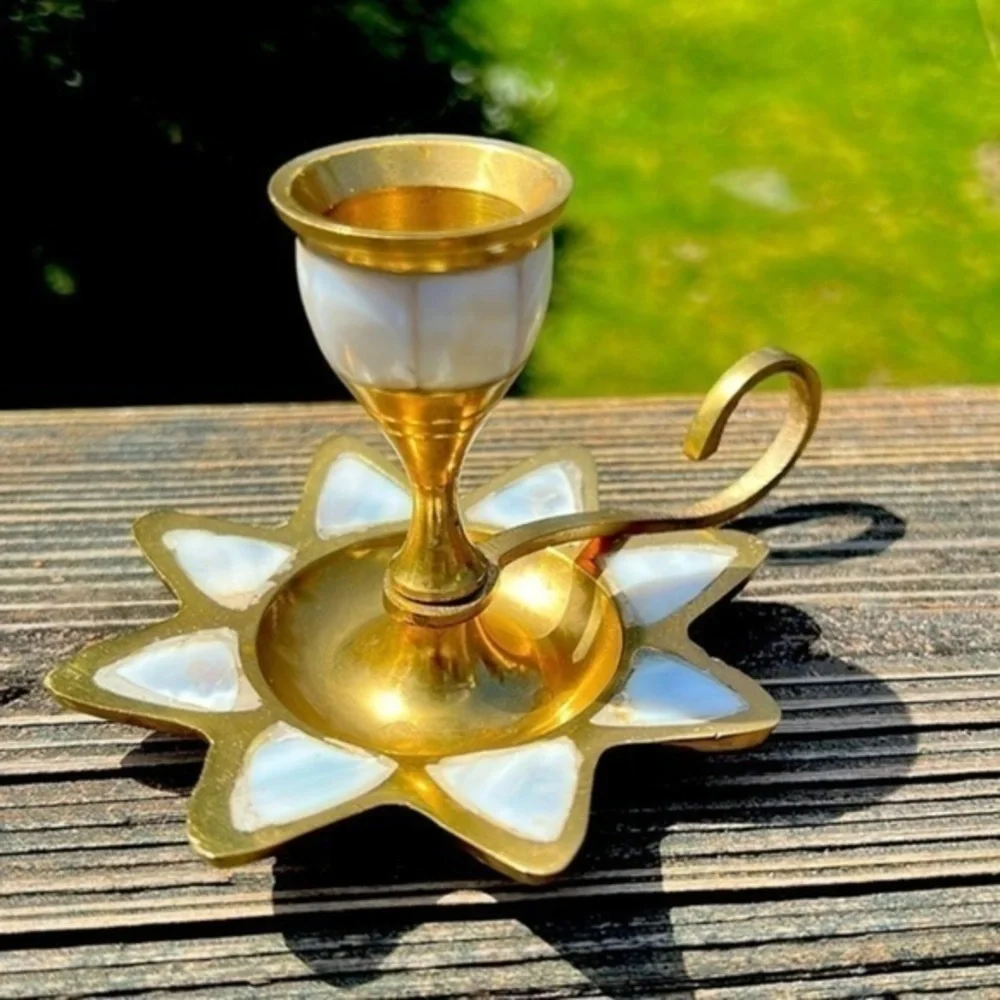 Brass candle holder.
